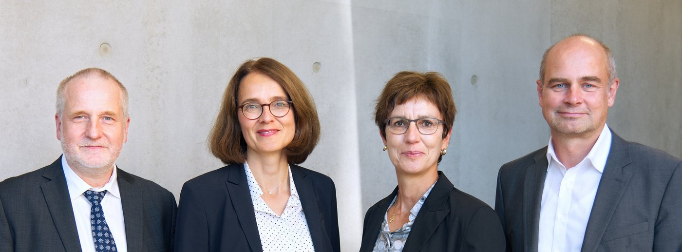 Group photo of the four board members of the Bernhard Nocht Institute