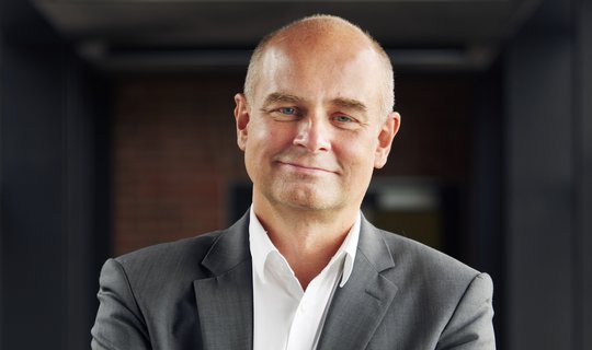 Portrait photo of Prof. Dr Jürgen May, an experienced, friendly-looking researcher