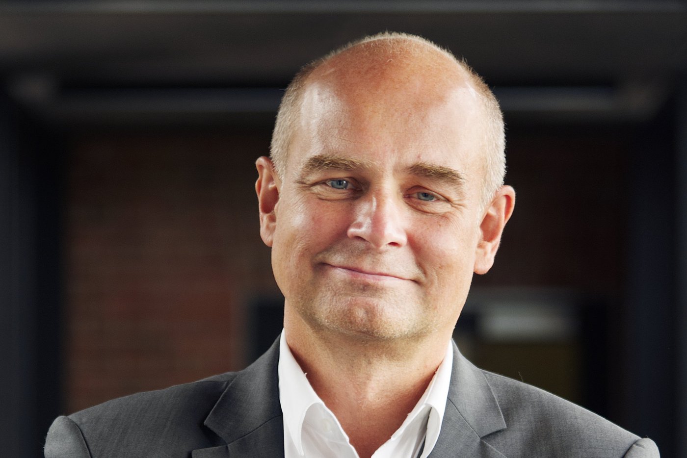 Portrait photo of Prof. Dr Jürgen May, an experienced, friendly-looking researcher