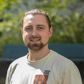Photo of Max Schultze Photo of a man with beard and dark blond hair.