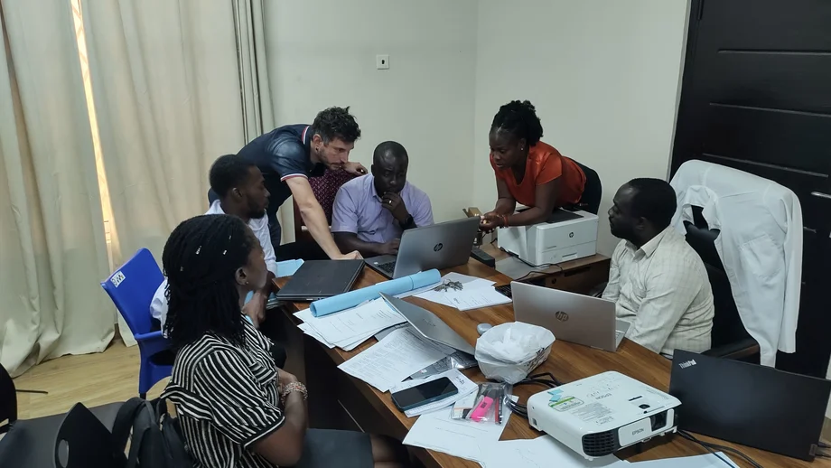 This image shows the Reproslep study team going through study documents
