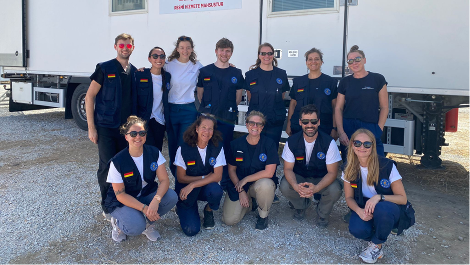 The twelve members of the EMLab team who participated in the EU MODEX in Çanakkale, Türkiye 17-22 September 2023. A picture of the twelve members of the EMLab Team in front of a white truck, all wearing blue EMLab shirts and vests, looking tired but very happy.