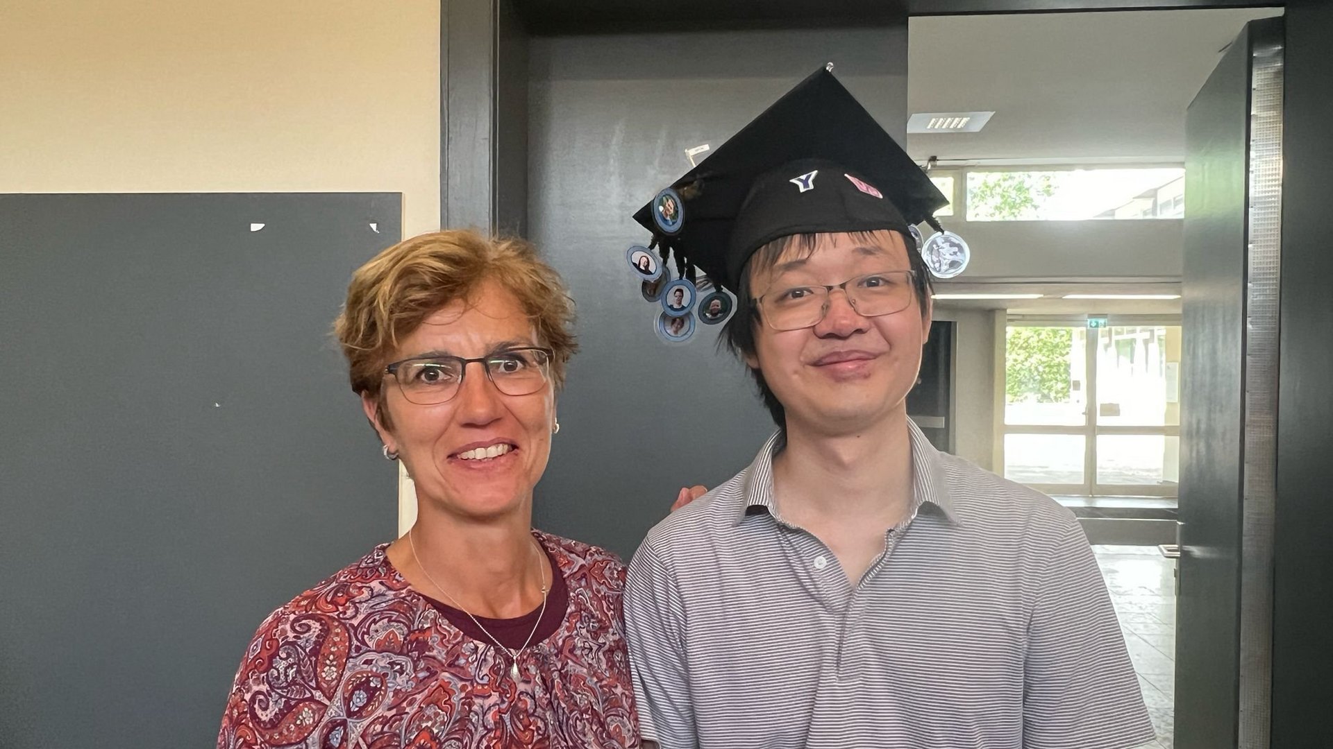 Researcher wearing PhD hat