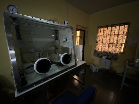 Glove box laboratory for the handling of infectious patient samples. Laboratory