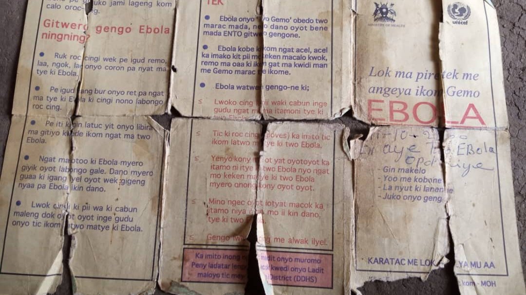 The picture shows a worn-out Ebola certificate.