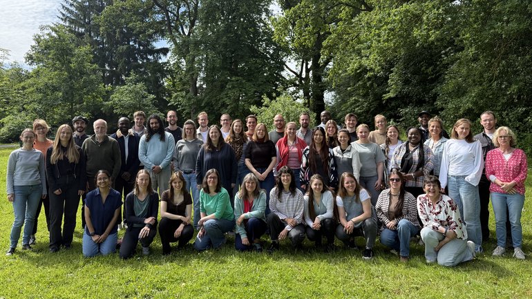 Department_of_Virology_2026 The staff members of the Department of Virology are displayed in a group photo outside.