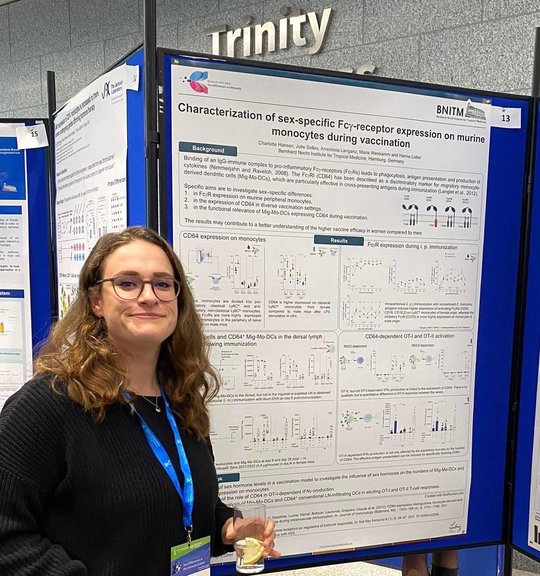 Charlotte Hansen from RG Lotter presents her poster at the Dublin Conference and smiles into the camera