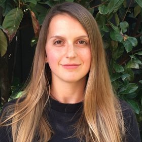 The picture shows a woman with long blond hair.