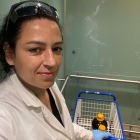 Photo of Maria Martens Photo showing a student in a lab coat.