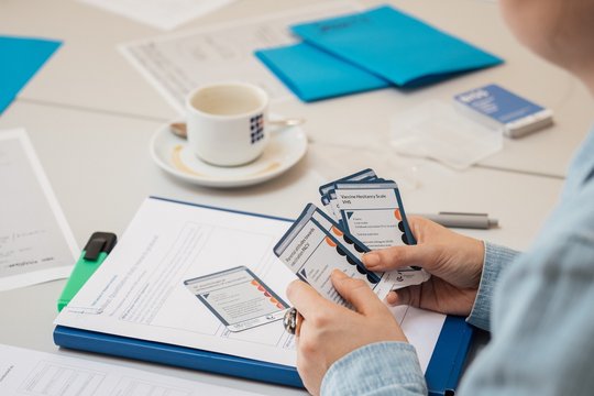 A card game for BCI tools Hands holding cards