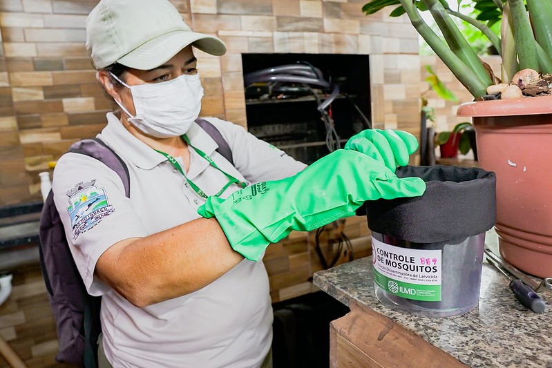 Inspecting mosquito trap for specimen collection